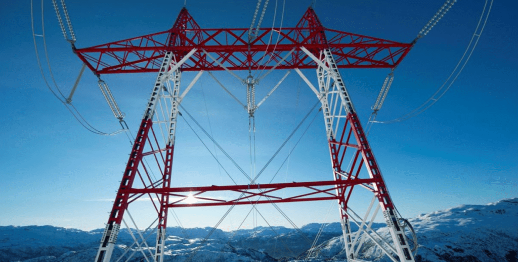 Et bilde som inneholder tårn, høyspentmast, himmel, konstruksjon Automatisk generert beskrivelse